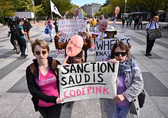 Protesters with the activist group Code Pink demonstrate outside the White House to call attention to the disappearance of Saudi Arabian journalist Jamal Khashoggi, in Washington, D.C. on October 19,  ...