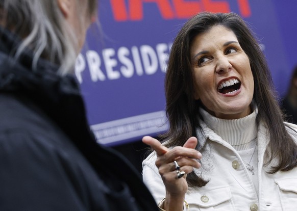 Republican presidential candidate Nikki Haley smiles as she talks to an audience member during a town hall at Legacy Manufacturing in Marion, Iowa, on Tuesday, Feb. 21, 2023. (Jim Slosiarek/The Gazett ...