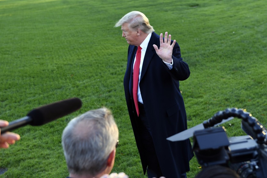 President Donald Trump talks to reporters on the South Lawn of the White House in Washington, Friday, Nov. 1, 2019. Trump is heading to Mississippi for a campaign event. (AP Photo/Susan Walsh)