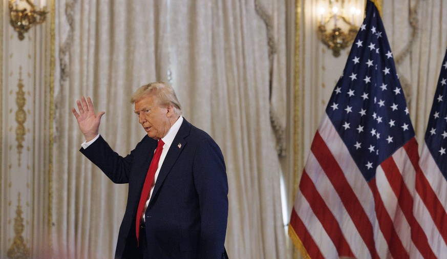 US-NEWS-TRUMP-MD-MI Republican presidential nominee former President Donald Trump waves as he exits after a news conference on Tuesday, Oct. 29, 2024, at his Mar-a-Lago estate in Palm Beach, Florida.  ...