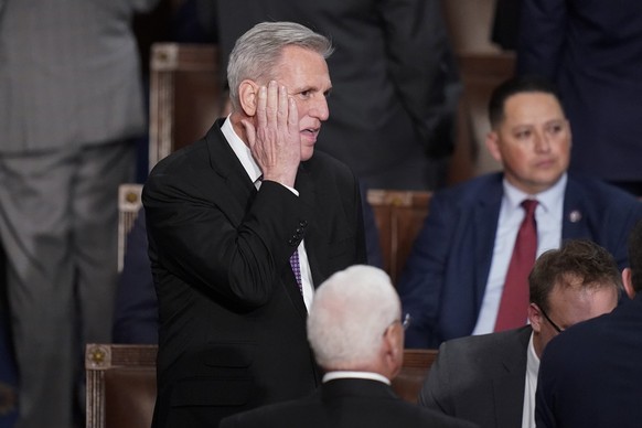 Rep. Kevin McCarthy, R-Calif., arrives to the House chamber at the beginning of an evening session after six failed votes to elect a speaker and convene the 118th Congress in Washington, Wednesday, Ja ...