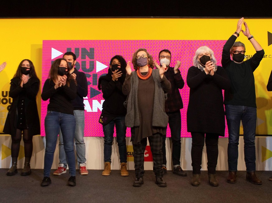 Members of the CUP party address a press conference after a meeting to analyze the first election results by the party in Barcelona, Catalonia, north-eastern Spain, after the Catalonian regional elect ...