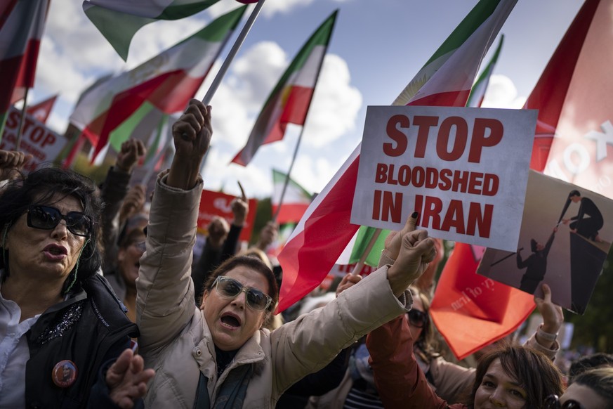 Thousands showed their support for Iranian protesters standing up to their leadership over the death of a young woman in police custody, during a demonstration in The Hague, Netherlands, Saturday, Oct ...