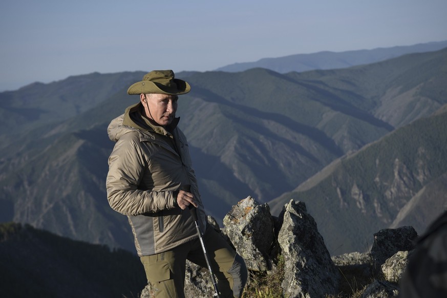 FILE - Russian President Vladimir Putin poses for a photo during a mini-break in the Siberian Tyva region, Russia on Sunday, Aug. 26, 2018. Vladimir Putin isn&#039;t quite the man he used to be — more ...