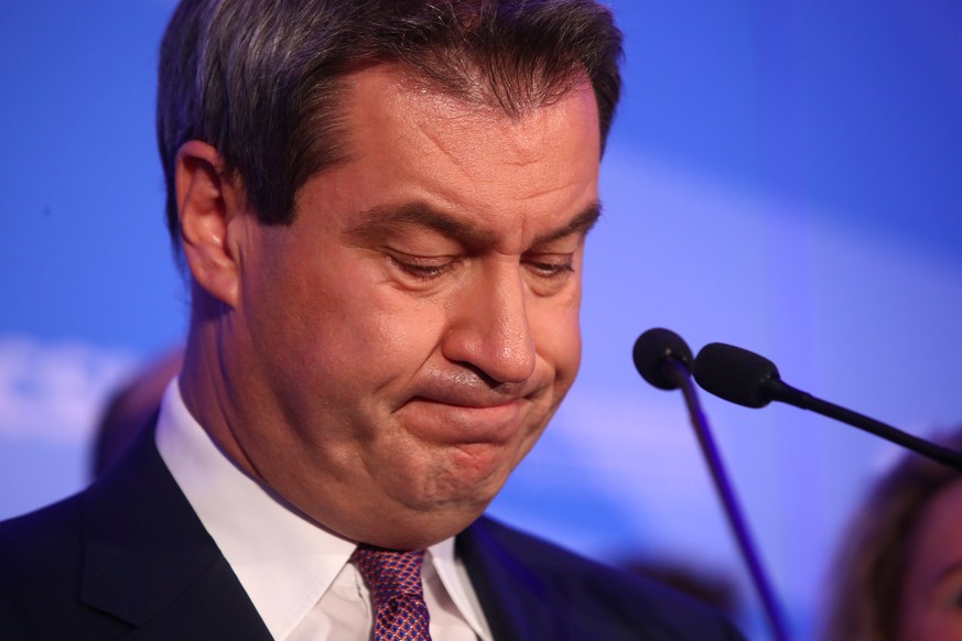 Bavarian State Prime Minister Markus Soeder of the Christian Social Union Party (CSU) reacts after first exit polls in the Bavarian state election in Munich, Germany, October 14, 2018. REUTERS/Michael ...