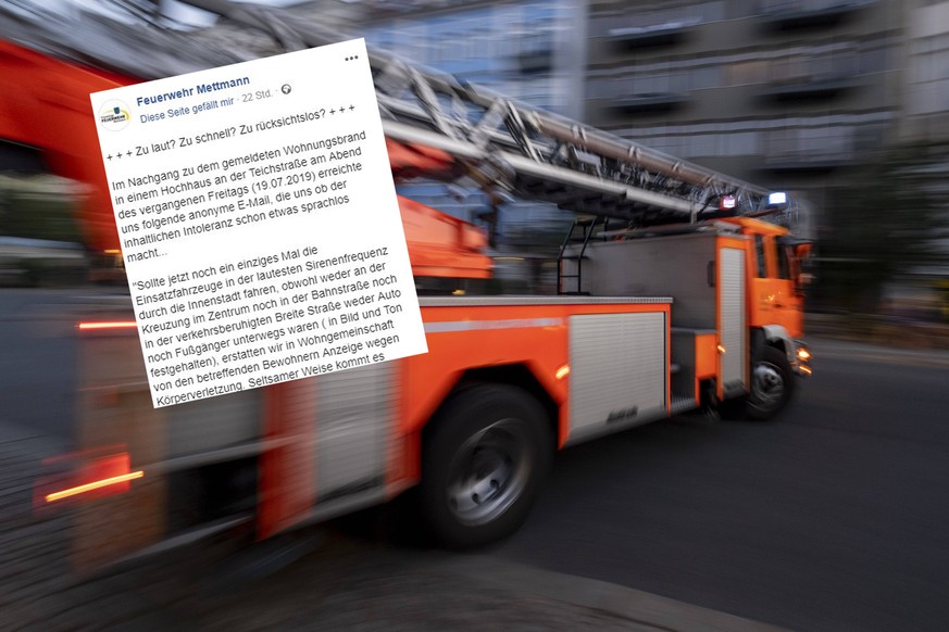 Drehleiter (DLK) der Berliner Feuerwehr beim ausrücken von der Feuerwache 1300 in der Oderberger Strasse in Berlin-Prenzlauer Berg snapshot-photography/R.Price *** Berlin fire brigades DLK turntable l ...