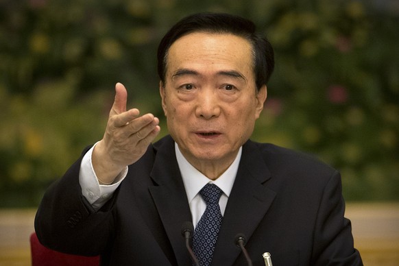 FILE - Chen Quanguo, Communist Party secretary of China's Xinjiang Uighur Autonomous Region, gestures while speaking during a group discussion meeting on the sidelines of China's National People's Con ...