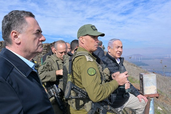 December 8, 2024, Golan Heights, Israel: Israeli Prime Minister BENJAMIN NETANYAHU R and Defense Minister ISRAEL KATZ L visit an observation point on Mt. Bental on the Golan Heights bordering Syria. T ...