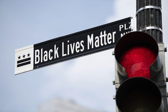 (200606) -- WASHINGTON, June 6, 2020 () -- The sign &quot;Black Lives Matter Plaza&quot; is seen in Washington D.C., the United States, on June 6, 2020. Chanting slogans while holding signs, thousands ...