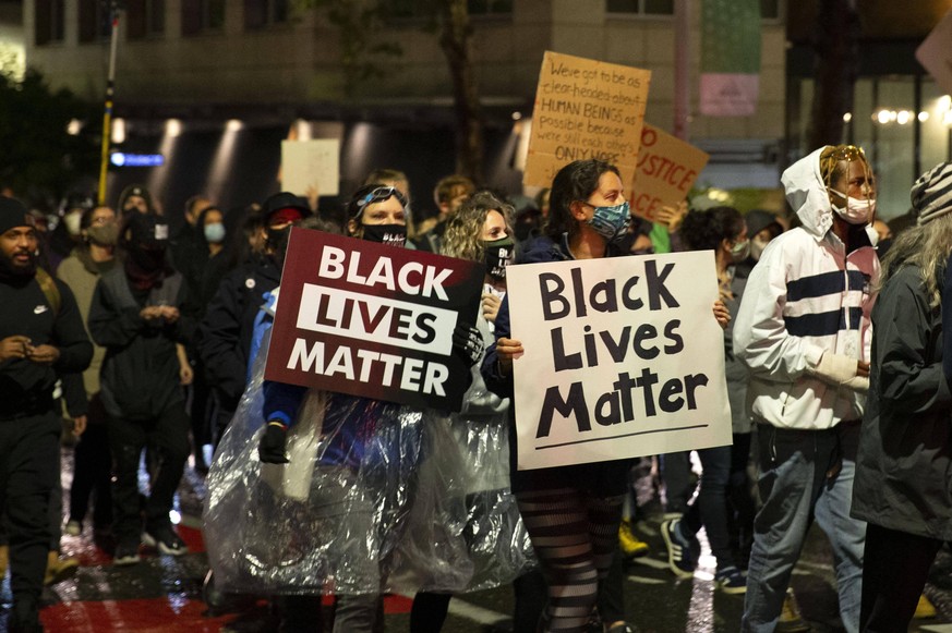 September 23, 2020, Seattle, Wa, Washington, United States: Protesters light candles and lay flowers outside the Federal Courthouse in remembrance of Breonna Taylor in Seattle, Washington, September 2 ...