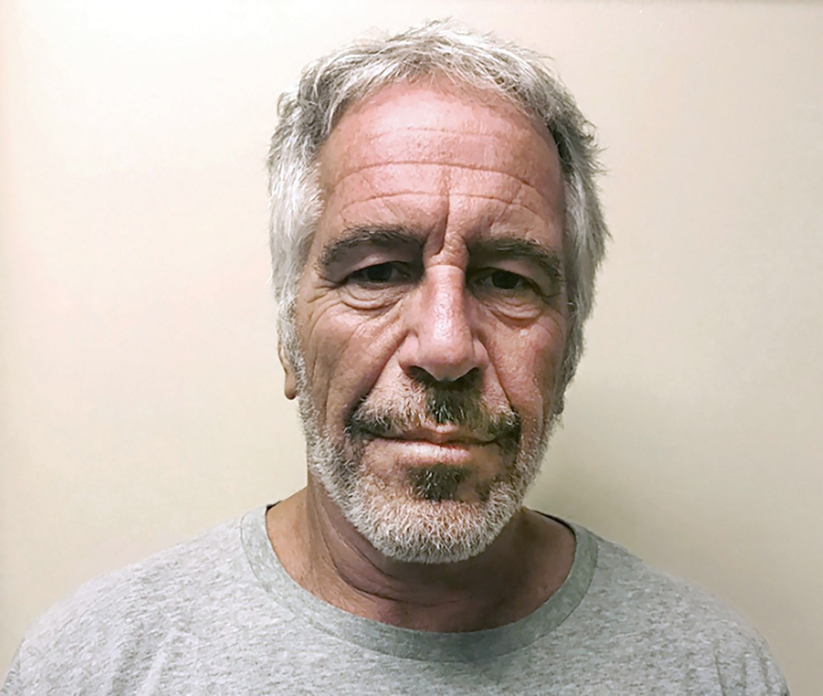 FILE - This March 28, 2017, photo provided by the New York State Sex Offender Registry shows Jeffrey Epstein. Transcripts of the Florida grand jury that investigated notorious sex trafficker Epstein n ...