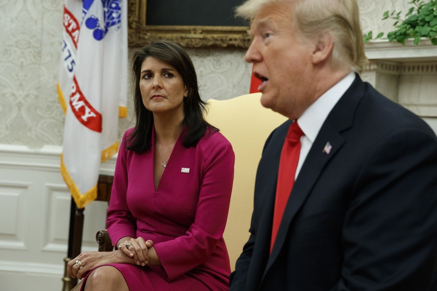 FILE - President Donald Trump speaks during a meeting with outgoing U.S. Ambassador to the United Nations Nikki Haley in the Oval Office of the White House, Oct. 9, 2018, in Washington. After Trump le ...