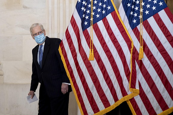 WASHINGTON, DC - NOVEMBER 10: Senate Majority Leader Mitch McConnell (R-KY) waits before speaking to the media at the US Capitol on November 10, 2020 in Washington, DC. Senators held a vote for leader ...