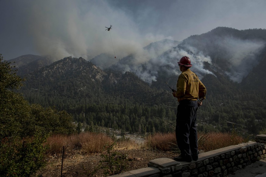 September 14, 2020, Forest Falls, California, USA: Captain JAMES KLOSEK of the Santa Barbara County Fire Department observes Helicopter operations at the El Dorado Fire. The is at 39% containment as o ...