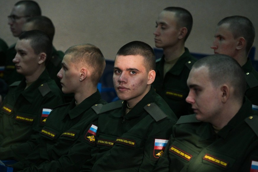 Russia Defence Conscripts 8538761 19.10.2023 Conscripts gather at an assembly station of a recruitment office before their departure for military service, in Novosibirsk region, Russia. Alexandr Kryaz ...