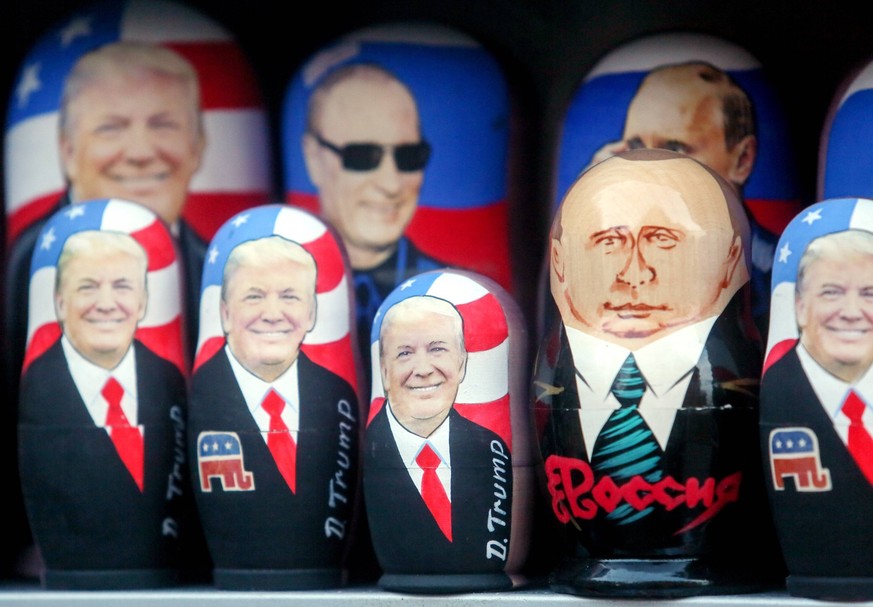 MOSCOW, RUSSIA - JANUARY 17, 2017: Russian Matreshka dolls depicting President-elect of the USA Donald Trump (L) and President of Russia Vladimir Putin, in a souvenir shop. Andrei Makhonin/TASS PUBLIC ...