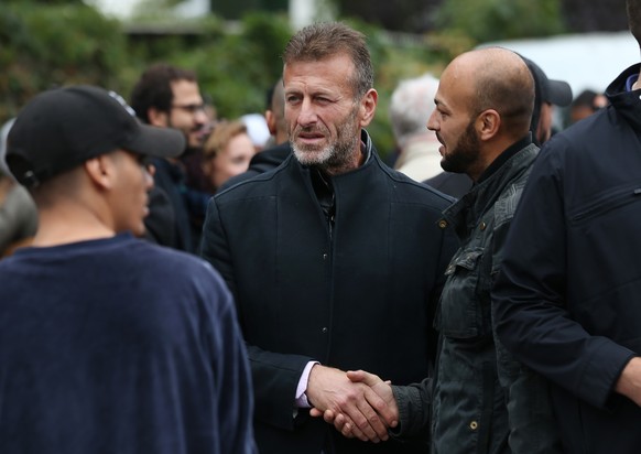 BERLIN, GERMANY - SEPTEMBER 13: Issa Remmo, head of the Lebanese Arab Remmo family that was investigated by police for money laundering, departs after attending the funeral of Nidal R. at the New 12 A ...