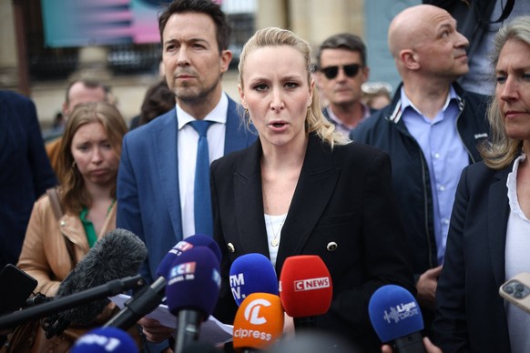 Declaration of Marion Marechal Outside National Assembly - Paris French far-right Reconquete party former lead candidate for the European parliament electioN Marion Marechal speaks to media representa ...
