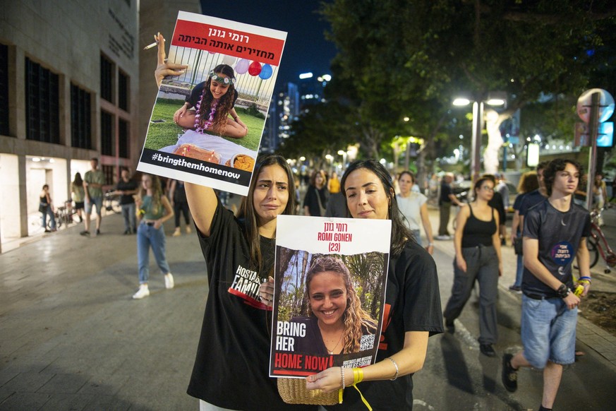 Demonstration for the release of the Hamas hostage in Tel Aviv, Israel - 04 Nov 2023 Two young women carry the portrait of Romi Gonen during the demonstration for the release of the Hamas hostages on  ...
