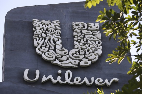 A Unilever logo is displayed outside the head office of PT Unilever Indonesia Tbk. in Tangerang, Indonesia, Tuesday, Nov. 16, 2021. Unilever says it raised prices by more than 11% between April and Ju ...