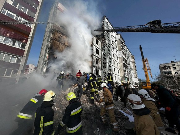 Rescuers work at the site of a residential building heavily damaged by a Russian missile, amid Russia&#039;s attack on Ukraine, in the town of Uman, Cherkasy region, Ukraine April 28, 2023. Press serv ...