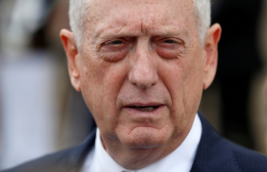 FILE PHOTO: Secretary of Defense Jim Mattis speaks with the media before an enhanced honor cordon arrival of Greek Minister of Defense Panagiotis Kammenos at the Pentagon in Washington, U.S., October  ...