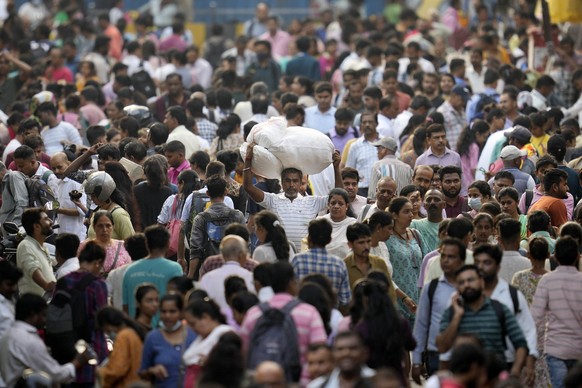 People throng a market place in Mumbai, India, Monday, April 24, 2023. The United Nations says India will be the world&#039;s most populous country by the end of April, eclipsing an aging China. (AP P ...