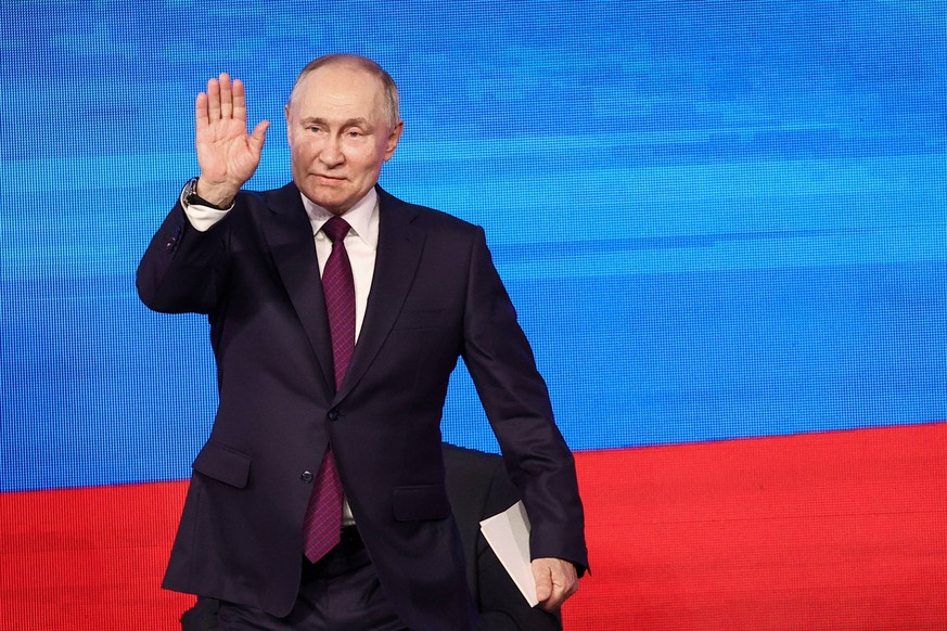 RUSSIA, MOSCOW REGION - JANUARY 16, 2024: Russia s President Vladimir Putin gestures during a ceremony for the Sluzheniye All-Russian Municipal Service Awards at Live Arena in Odintsovo, west of Mosco ...