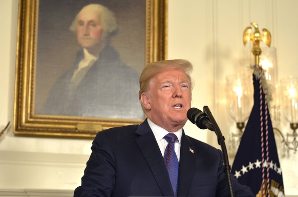 President Donald Trump makes remarks as he speaks to the nation, announcing military action against Syria for the recent gas attack on civilians, at the White House, April 13, 2018, in Washington, DC. ...