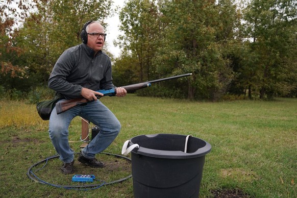 September 25, 2018, Le Sueur, Minnesota, USA: Gubernatorial candidate TIM WALZ watched a clay target sailed just out reach of his shot on the sporting clay course at the Caribou Gun Club in Le Sueur,  ...