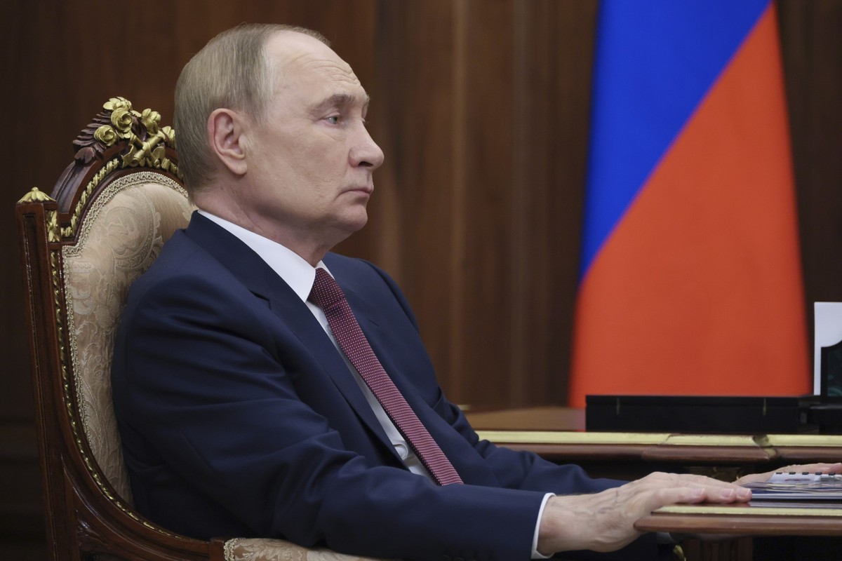Russian President Vladimir Putin attends a meeting with acting governor of the Rostov region Yuri Slyusar at the Kremlin in Moscow, Russia, Monday, Aug. 18, 2025. (Vyacheslav Prokofyev, Sputnik, Kreml ...
