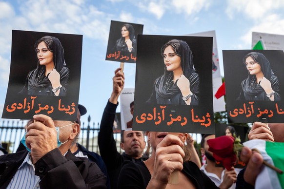 Washington, DC protest for Mahsa Amini People hold signs with images of Mahsa Amini at the White House, during a protest against her death in custody of Iran s morality police. Protests against the 22 ...