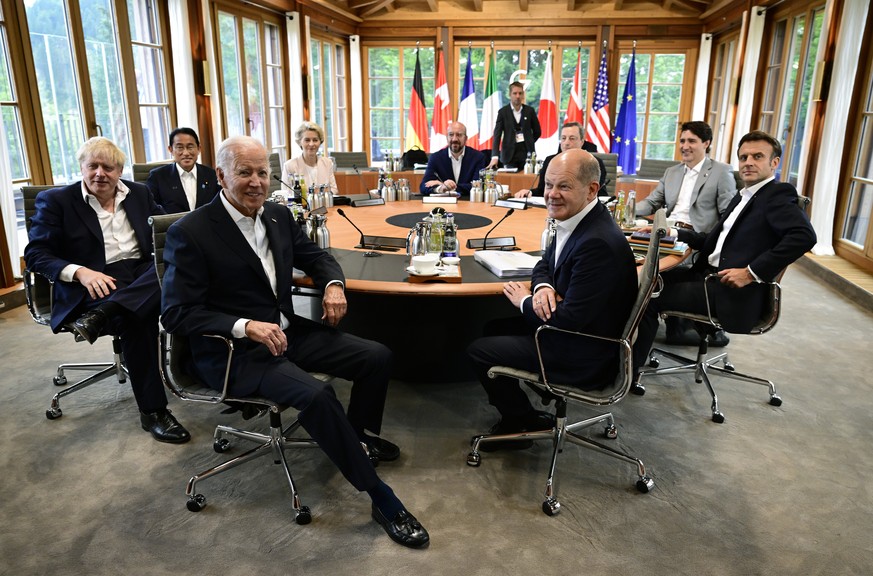 Clockwise from left, British Prime Minister Boris Johnson, Japanese Prime Minister Fumio Kishida, the President of the European Commission Ursula von der Leyen, European Council President Charles Mich ...