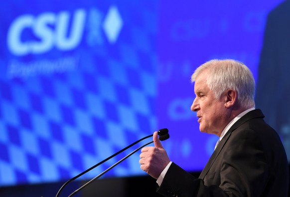 Leader of the Christian Social Union (CSU) Horst Seehofer speaks during a party meeting devoted to presentation of an election programme ahead of a regional vote, in Munich, Germany, September 15, 201 ...