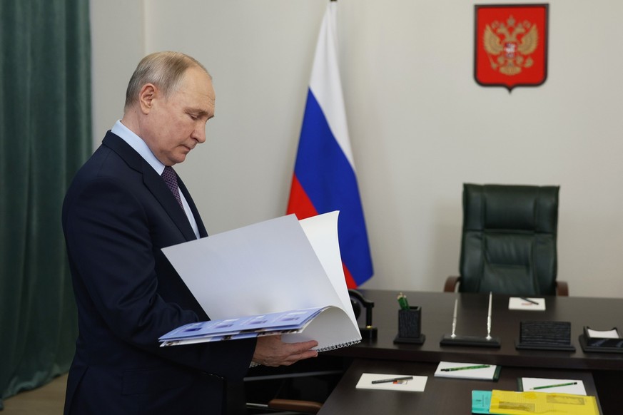 Russian President Vladimir Putin is seen before a meeting with Khabarovsk Region Governor Mikhail Degtyarev in Khabarovsk, Russia, Thursday, Jan. 11, 2024. (Gavriil Grigorov, Sputnik, Kremlin Pool Pho ...