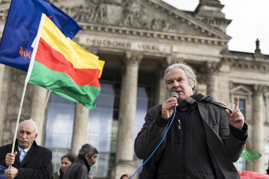 March 10, 2017 - Berlin, Berlin, Germany - ANDREJ HUNKO, Mitglied des Deutschen Bundestags fr die Partei Die Linke, speaks in front of the protesters. Yezidi representatives and Kurds demanding politi ...