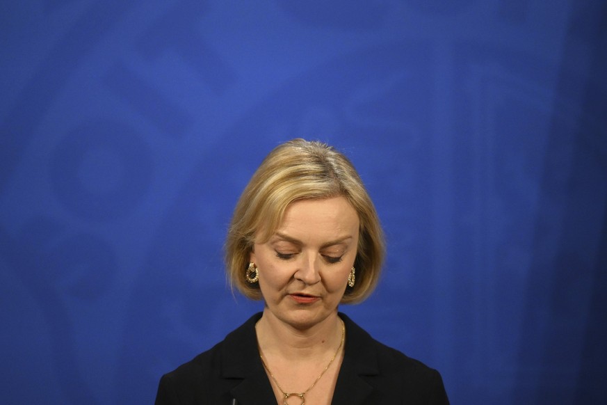 Britain&#039;s Prime Minister Liz Truss holds a press conference in the Downing Street Briefing Room in central London, Friday Oct. 14, 2022. Embattled British Prime Minister sacked her Treasury chief ...