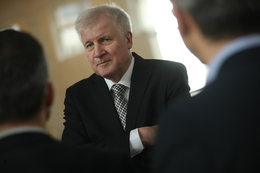 BERLIN, GERMANY - MARCH 14: German Interior Minister designate and Bavarian Christian Democrat (CSU) Horst Seehofer chats with journalists during a break in the swearing-in of the new German governmen ...