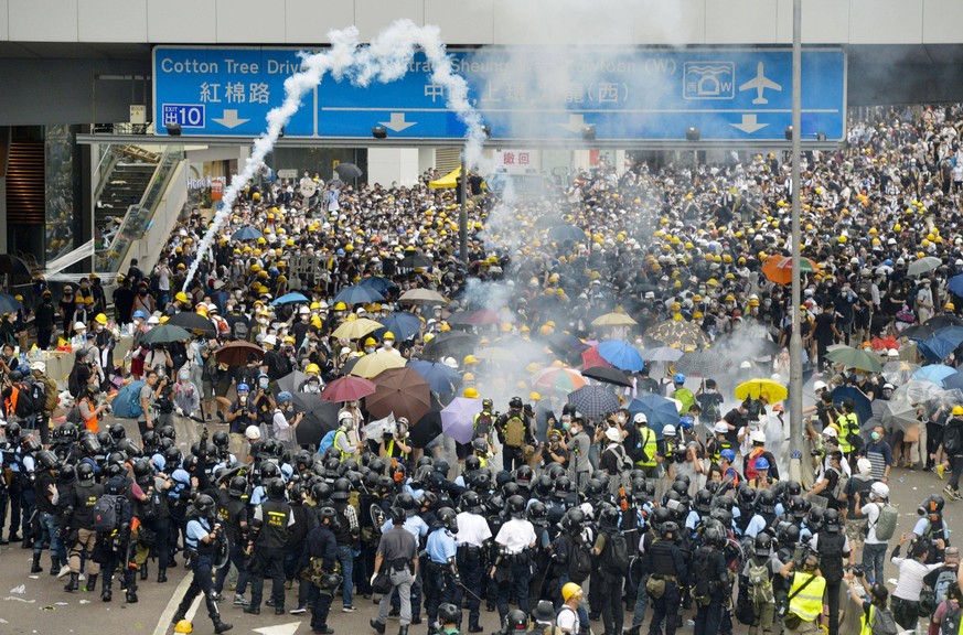 Hong Kong demonstration against extradition bill Protesters opposing a controversial extradition bill clash with riot police near Hong Kong s legislature building on June 12, 2019. The protest by tens ...