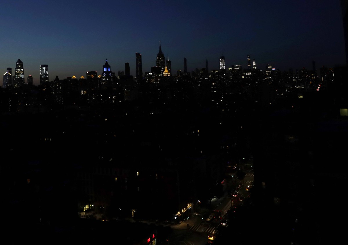 The Empire State Building along with other structures in Manhattan are dark due to a massive power outage In Midtown, Times Square, and other sections of Manhattan on Saturday July 13, 2019 in New Yor ...