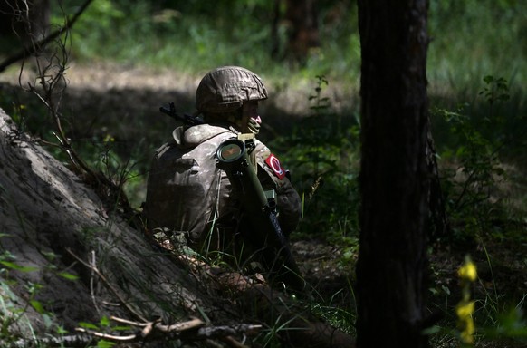 Russia Ukraine Military Operation Flamethrower Unit 8483934 13.07.2023 A member of the Russian flamethrower unit of the Central Military District stands at a position in the course of Russia s militar ...