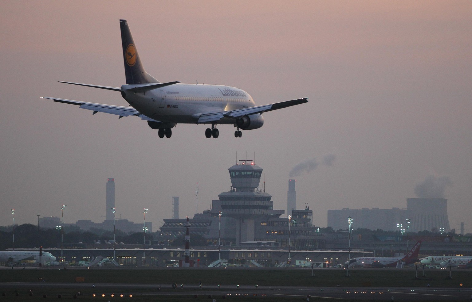 BERLIN, GERMANY - OCTOBER 17: A Lufthansa passenger plane arrives at Tegel Airport on October 17, 2011 in Berlin, Germany. Tegel, which first went into operation in 1960 and whose main, hexagonal term ...