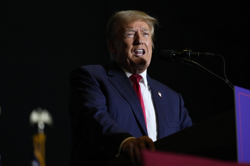 Former President Donald Trump speaks during a commit to caucus rally, Sunday, Oct. 1, 2023, in Ottumwa, Iowa. (AP Photo/Charlie Neibergall)