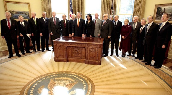 Jan. 5, 2006 - U.S. - President Bush pauses for a photograph on Thursday, January 5, 2006, with present and former Secretaries of State and Defense in the Oval Office at the White House in Washington, ...