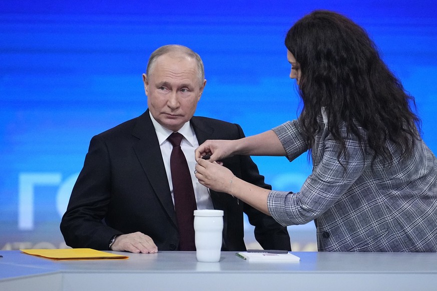 Russian President Vladimir Putin prepares to attend his annual news conference in Moscow, Russia, Thursday, Dec. 14, 2023. (AP Photo/Alexander Zemlianichenko, Pool)