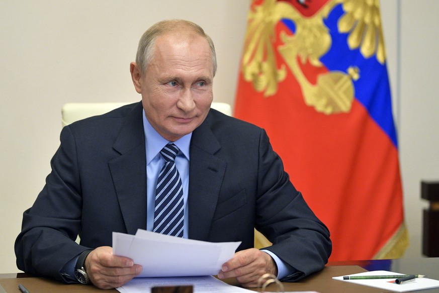 Russian President Vladimir Putin attends a video conference meeting at the Novo-Ogaryovo residence outside Moscow in Moscow, Russia, Thursday, July 9, 2020. (Alexei Druzhinin, Sputnik, Kremlin Pool Ph ...