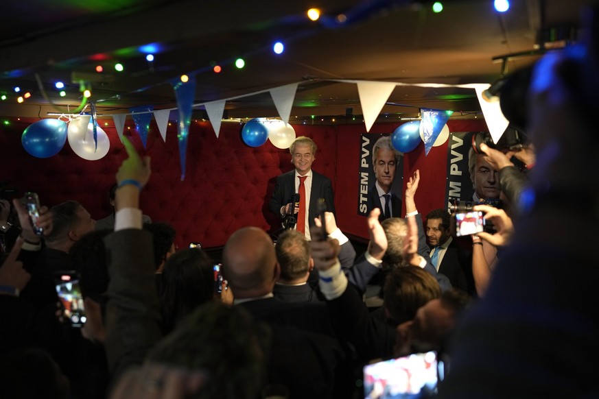 Geert Wilders, leader of the Party for Freedom, known as PVV, smiles as he addresses the first preliminary results of general elections in The Hague, Netherlands, Wednesday, Nov. 22, 2023. (AP Photo/P ...