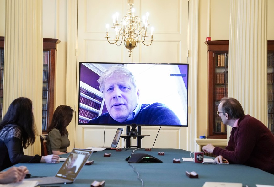 200329 -- LONDON, March 29, 2020 Xinhua -- British Prime Minister Boris Johnson C chairs a morning COVID-19 update meeting remotely during his self-isolation after testing positive for COVID-19, in Lo ...