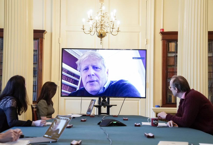 200329 -- LONDON, March 29, 2020 Xinhua -- British Prime Minister Boris Johnson C chairs a morning COVID-19 update meeting remotely during his self-isolation after testing positive for COVID-19, in Lo ...