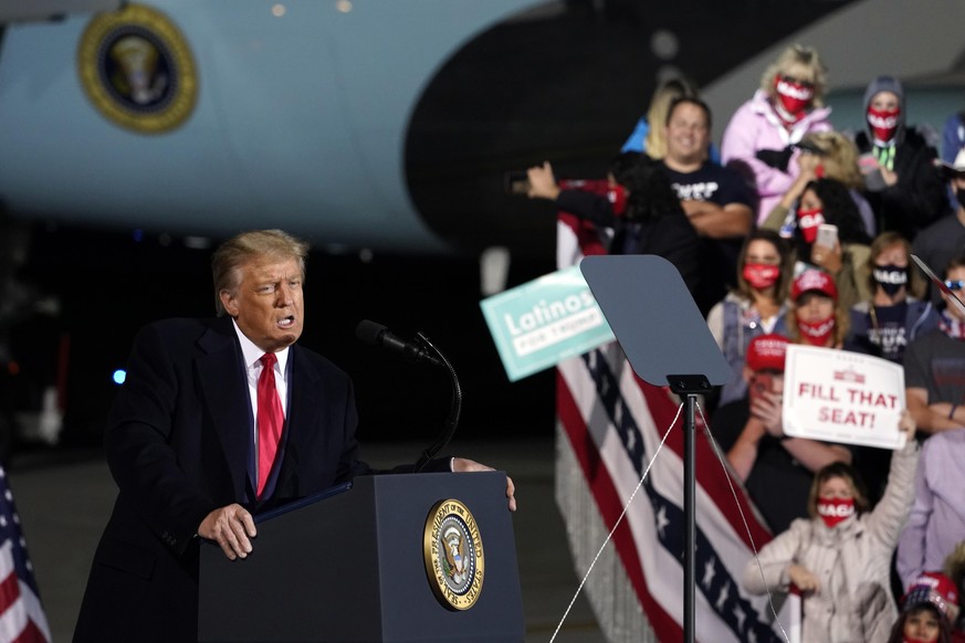 President Donald Trump speaks during a campaign rally at Eugene F. Kranz Toledo Express Airport, Monday, Sept. 21, 2020, in Swanton, Ohio. (AP Photo/Alex Brandon)